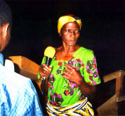 Blind woman testifies that Jesus has opened her eyes at Crusade in Togo, West Africa - January 2001